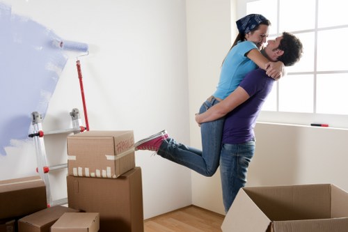 Commercial moving crew relocating office furniture in The Burroughs
