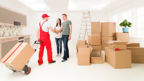 Commercial office furniture being prepared for a local move