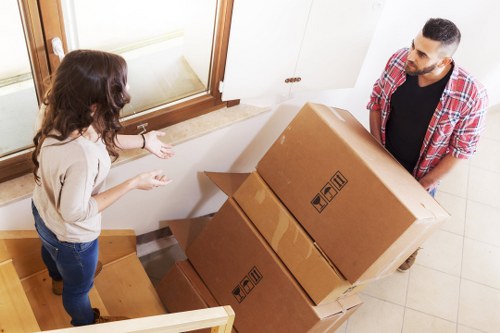 Careful loading of household items by a local removal crew