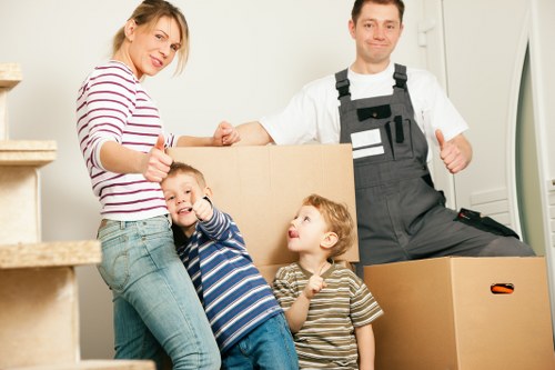 Local moving team handling furniture transport near The Burroughs