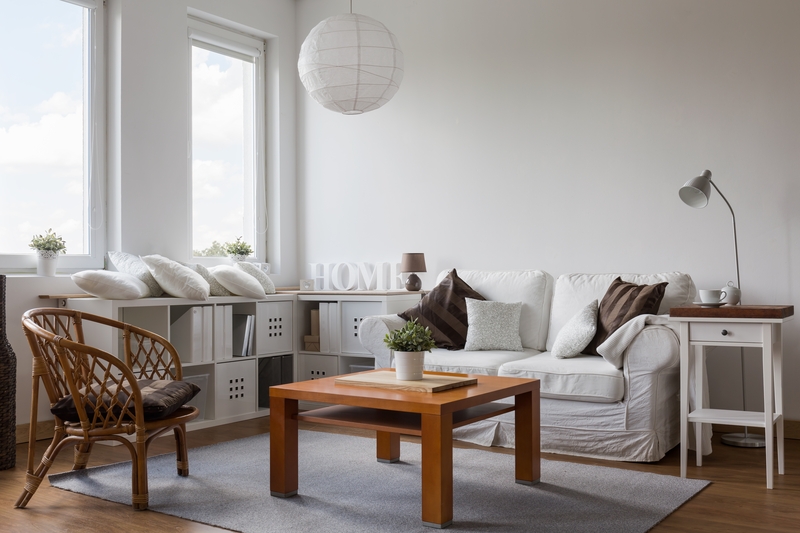 Movers handling boxes and household items in a townhome move